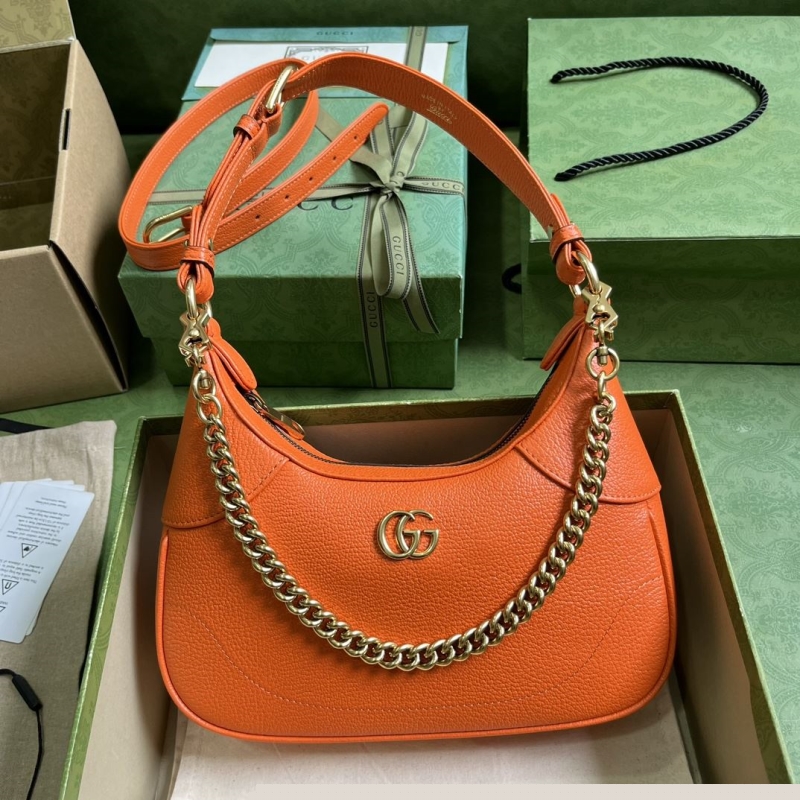 G*u*i top handle bags